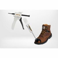 A TUFF TOE adhesive dispenser gun alongside a tube of black TUFF TOE adhesive being applied to the front of a brown work boot on a white background.