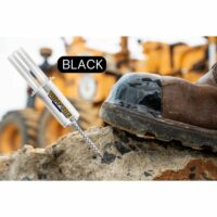 Detail of a worn leather boot's toe area treated with black TUFF TOE protection, accompanied by a TUFF TOE adhesive tube emphasizing the color 'BLACK', set against a rugged construction site background
